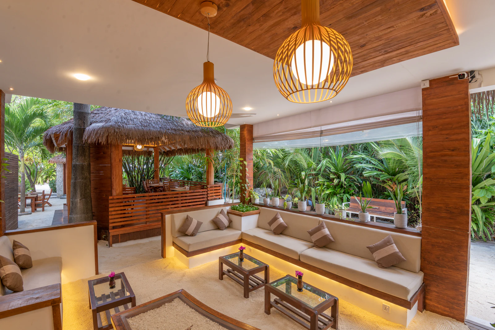 The open-air lobby lounge and reception at Ostrov Beach on Ukulhas