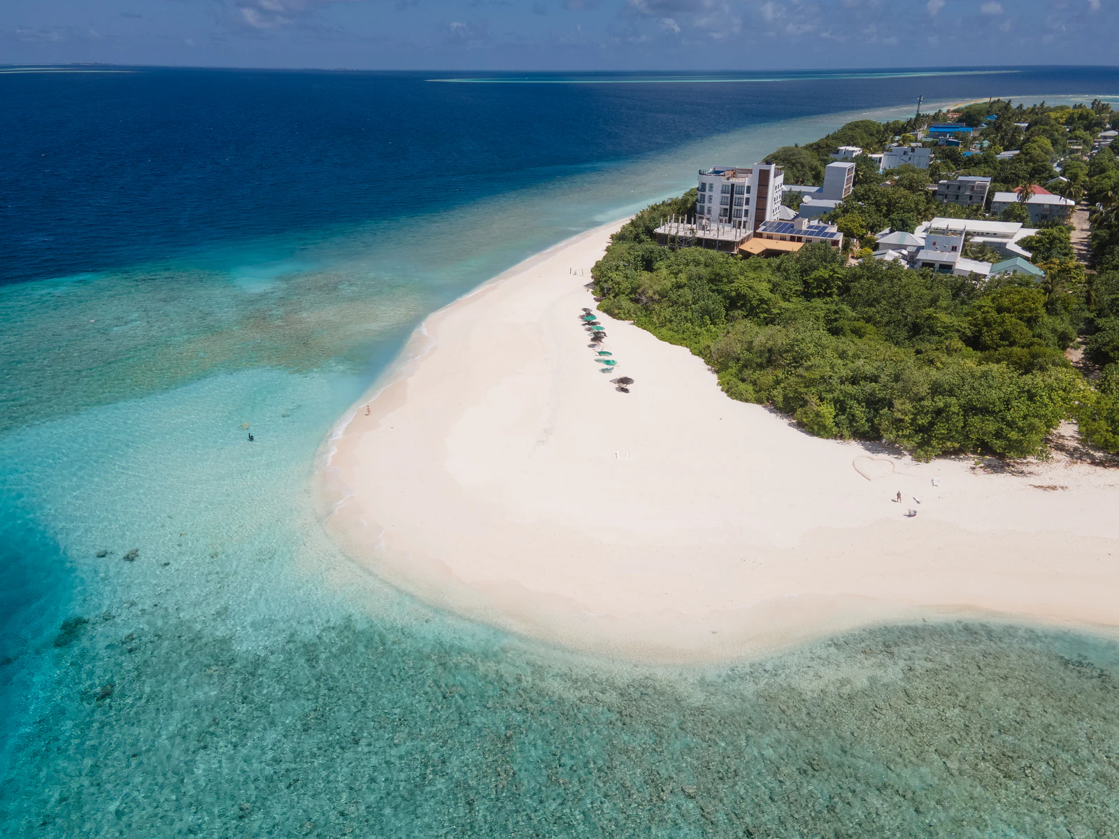Aerial view of the green island and reef of Ukulhas